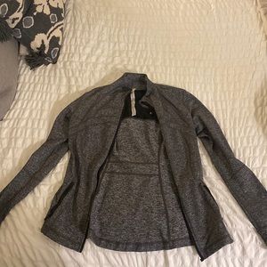 Only worn 1-2 times. Lululemon zip up jacket size 10.